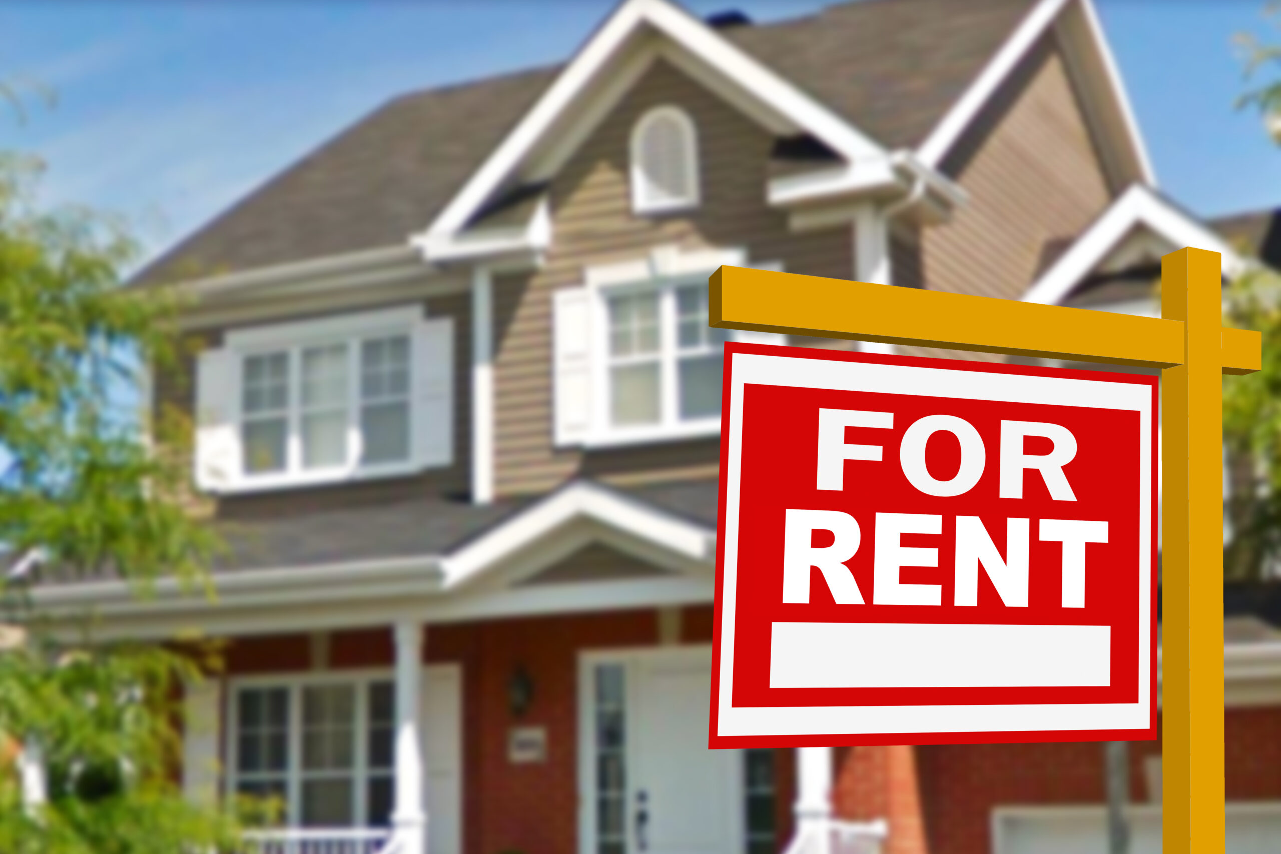 House for rent with sign in front of new home